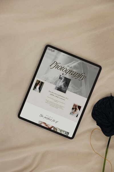 iPad mockup featuring the Isabella Showit website template for wedding photographers; displays elegant layout and romantic gallery design to attract luxury photography clients.