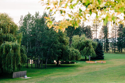 Lush wedding venue grounds at The Barn at Finley Point in Polson, MT