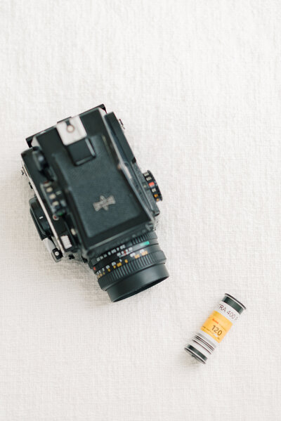 medium format film camera and roll of film