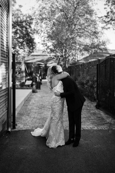 black and white photo of bride and groom