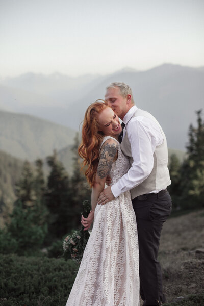 bride and groom kissing