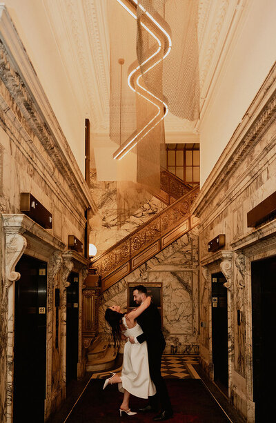 Couple Dipping at the Industrialist Hotel During their Engagement