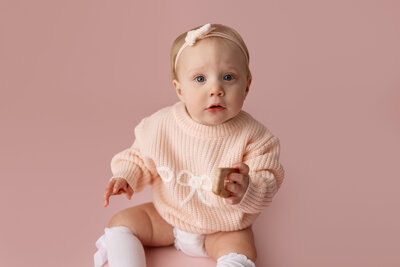tulsa baby girl in pink outfit