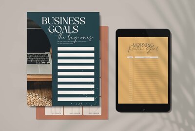 Business goal workbook printed and on an iPad
