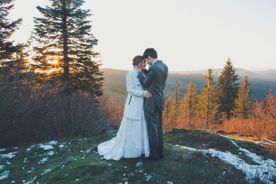a bride and groom hugging after exchanging vows nea Silver Star Mountain