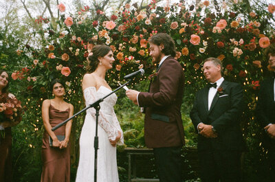 groom reading his vows to his bride to be