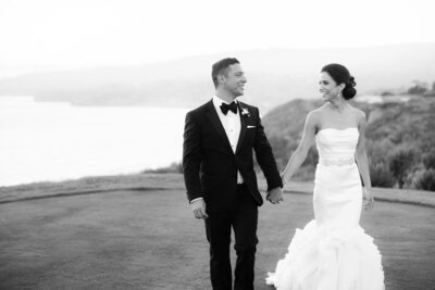 Bride and groom walk up memorial steps at their DC wedding