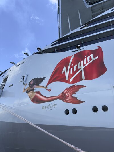 Virgin Voyages Resilient Lady cruise ship docked in Martinique