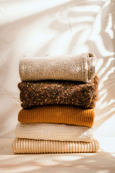stack of sweaters  