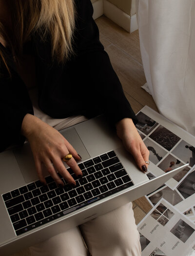 editorial stock images - laptop and woman typing