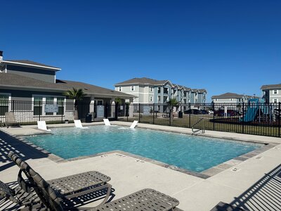 Resort style pool at The Haven Apartments in Gregory Texas showcasing community amenities maintained by WLS Interests.