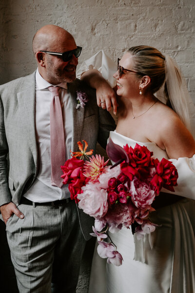 A couple share some laughs in the main room at 100 Barrington in London. 