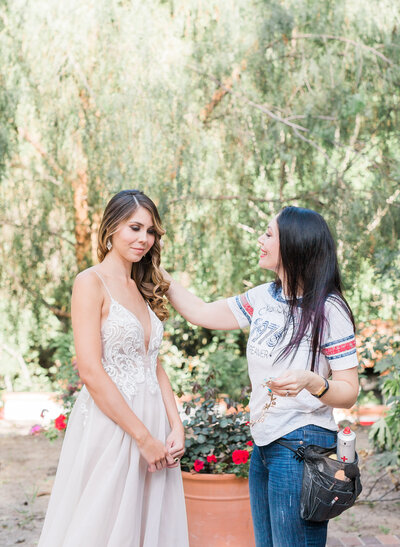 Bride Getting Her Touch Up by Cole Saad