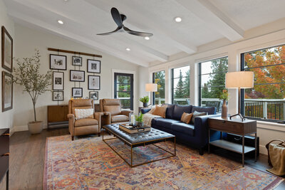 Bright and modern living room of Manito Cottage renovation project designed by Coeur d'Alene interior design firm Sarro Design.