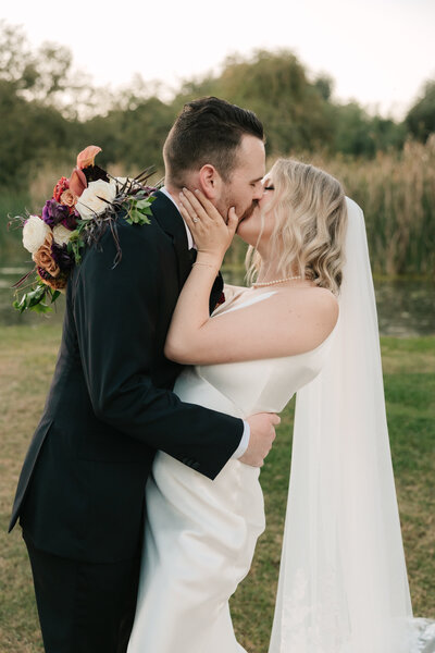 bride and groom kissing