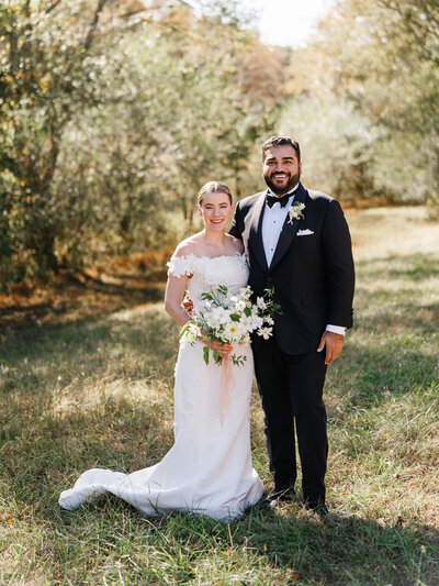 A couple posed on their wedding day at Kingston Downs in Rome, GA