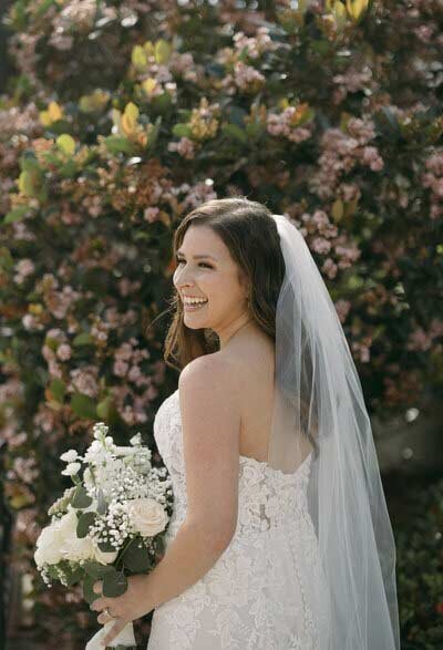 Newlywed bride getting photos on her wedding day