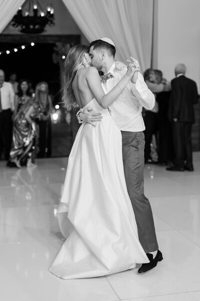 Bride and groom dance at their wedding reception