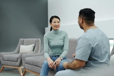 patient on couch talking with doctor
