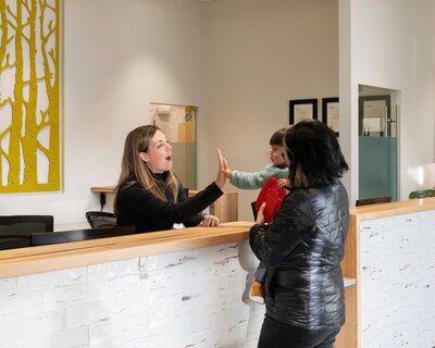 Bright and welcoming waiting area with child-friendly decor at Gateway Pediatric Dentistry