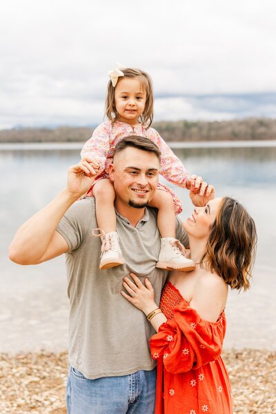 parents playing with their toddler