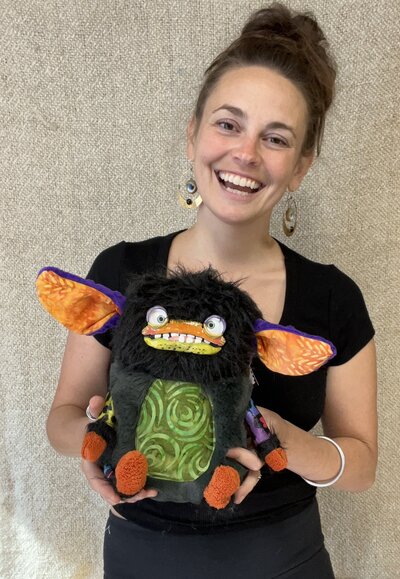 Natalie holding Handmade fabric sculpture