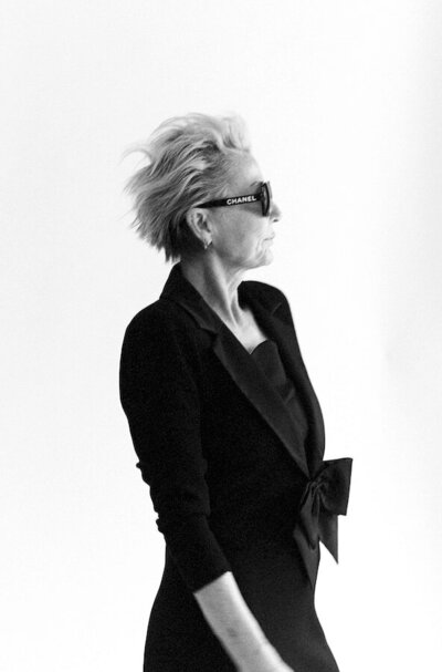 creative black and white portrait of a mature woman looking to the side