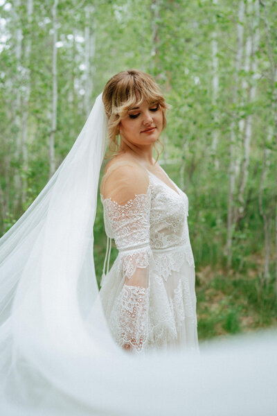 Bride and groom during wedding golden hour portrait session at Sun Valley Idaho wedding - photographed by The Storytellers