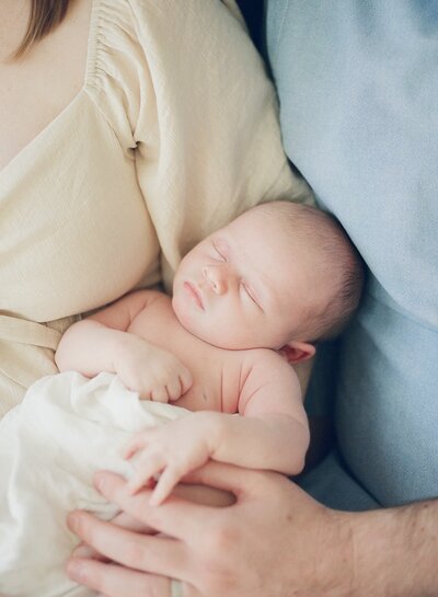 baby sleeping at relaxed in-home newborn session