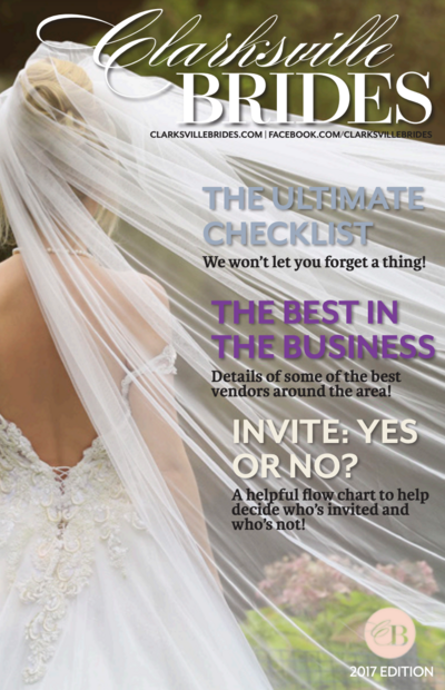 magazine cover of 2017 edition of Clarksville Brides showing the backside of a bride in her white wedding dress with white long veil blowing in the wind