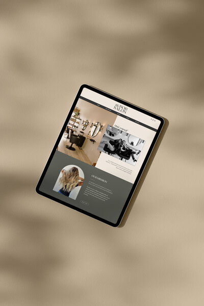 Tablet showing chic hair salon website design in Fort Wayne, IN