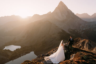 Couple exploring Bow Lake in Banff