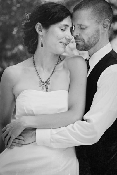 Black and white portrait of a bride and groom on their wedding day
