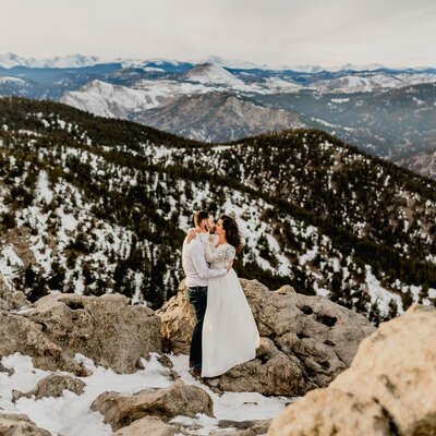 Couple on a beautiful mountain scape