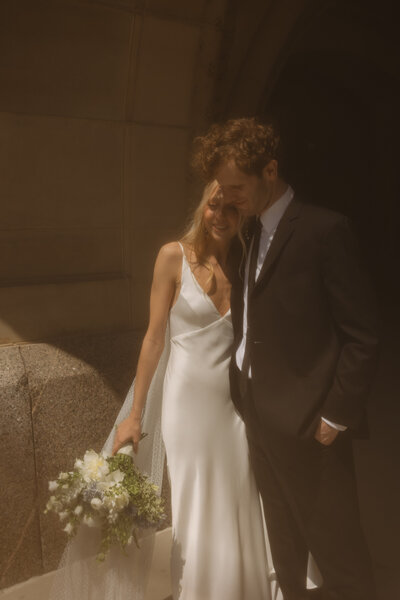 Golden sun Bride and Groom couple embracing