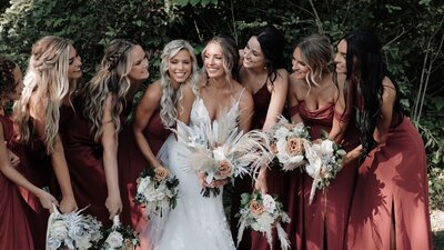 Bride with bridesmaids gets married in boho ceremony