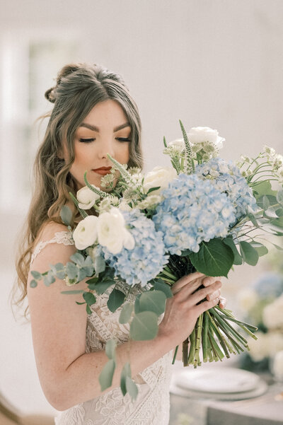 Dallas-Fort Worth Wedding Photographer | The BowdenWedding + Event Center Bridal Portraits | Fine Art Film | Bride w/Orange Pink Floral Bouquet | Lace Wedding Gown
