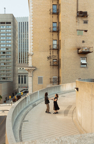 couple on rooftop in the Exchange District 