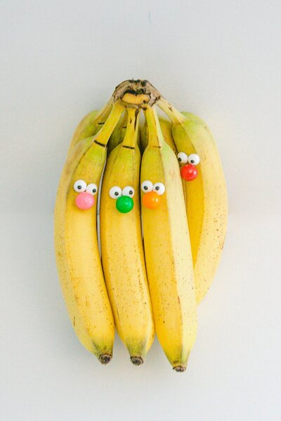 a bunch of bananas with funny googly eyes
