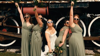 Bride squad having fun on their wedding day. Caught on film by non-traditional wedding videographer, HC Visuals.