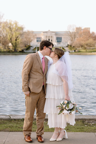 Couple kissing at Wade Lagoon in Cleveland, Ohio.