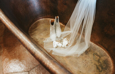Bridal details in a copper bath tub.