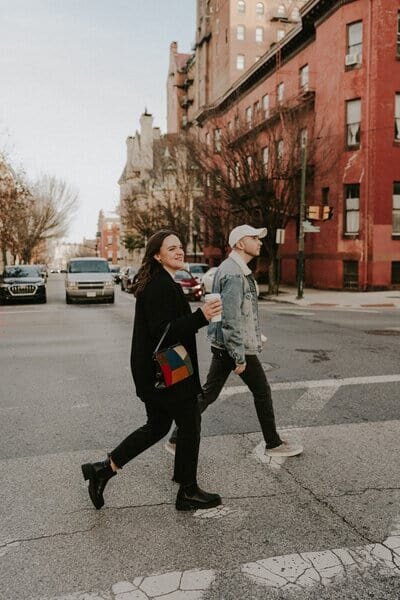 Couple walking through baltimore city