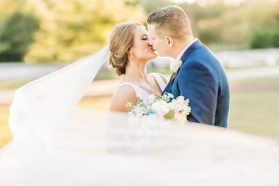 Bride and groom sharing an intimate embrace, celebrating their love on their wedding day. A timeless moment filled with elegance and deep connection
