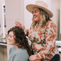 Kylie Crinnian, owner of Moxie by KC and curly hair educator teaches a class