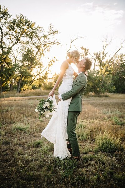 Bride and Groom hold hands at the Denver Botanic Gardens.