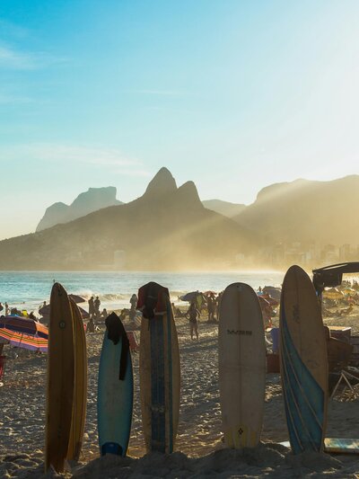 Surfboards on beach in Brazil Rio De Janiero - Santai Retreats - longboarding retreat in Brazil