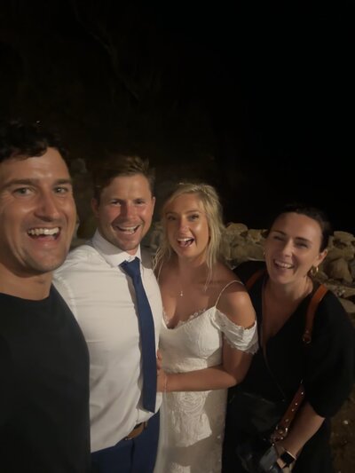 Amy & Nick posing with couple