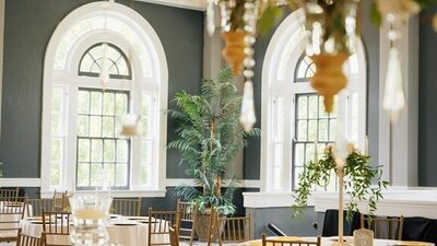 luxury wedding couple posing inside Hotel Carmichael Carmel Indiana