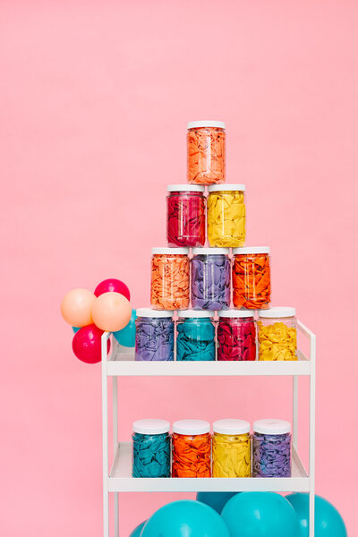 The sweet side of creativity with our Balloon Artist at Air with Flair Decor, savoring a delightful cupcake. Our skilled team combines the joy of balloons with the sweetness of treats for an extra dose of fun.